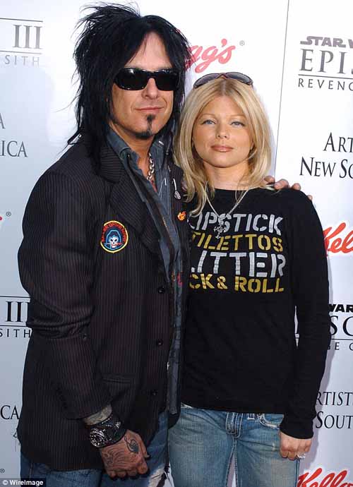 A picture of Donna D'Errico with her ex-husband Nikki Sixx.